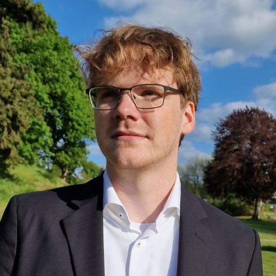 [Translate to Dansk:] Adam Blatchley Hansen er PhD studerende i datalogi på Aarhus Universitet og assisterende landstræner for cyberlandsholdet