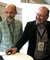 Lars Arge (mid) at Danish Festival of Research 2012 explaining his research to the Danish Minister for Science, Innovation and Higher Education, Morten Østergaard (right)